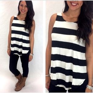 Black and white curved hem with low cut back soft tank size small from boutique